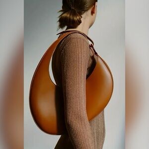 Sculpted Crescent Shoulder Bag in Cognac Brown
